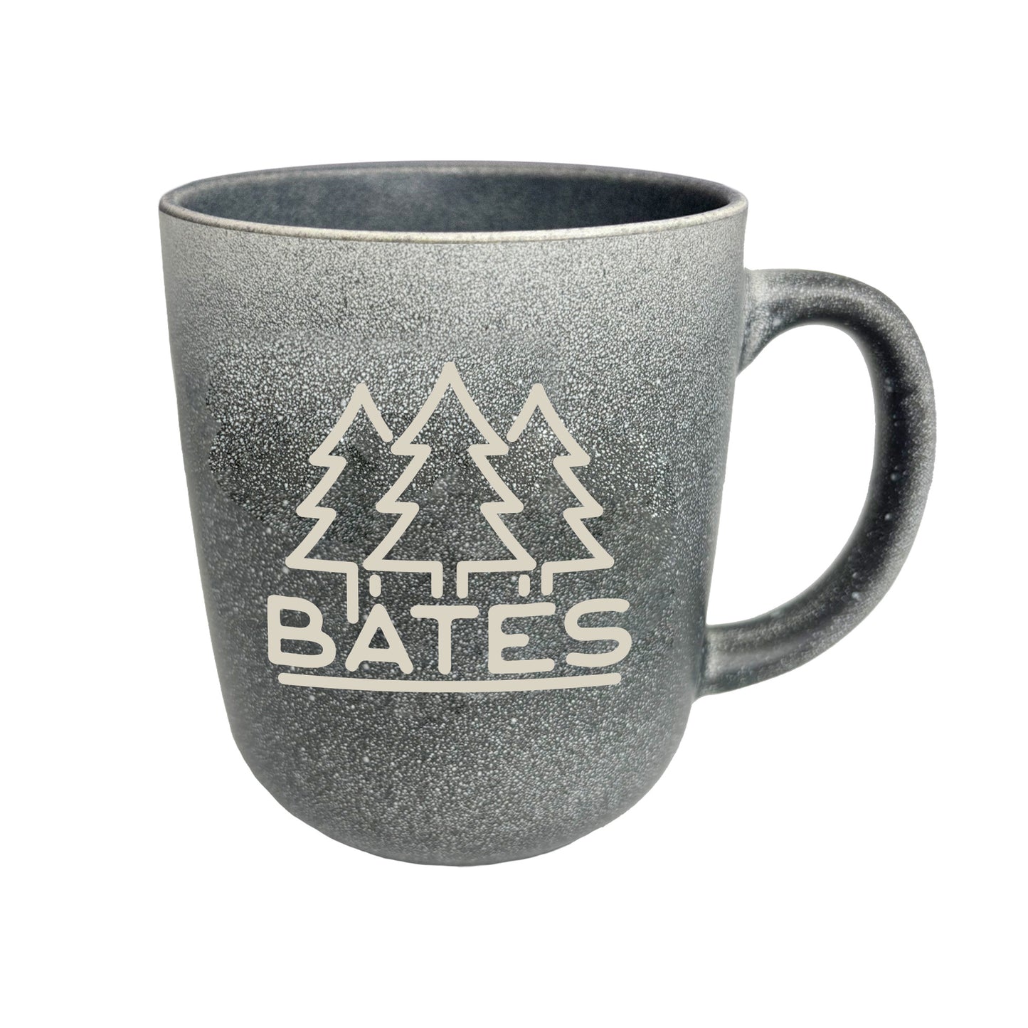 Gray mug with 'Bätes' featuring three trees on a white background