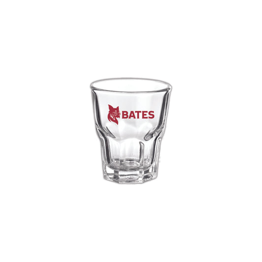 Clear glass shot glass with 'Bates' logo on a white background