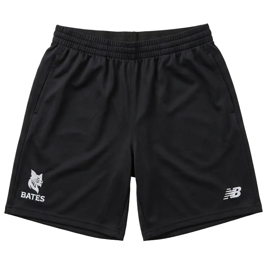 Black athletic shorts with an elastic waistband, featuring a white printed New Balance logo on the left leg and a white printed Bates text with a bobcat graphic on the right leg, displayed flat against a light gray background.