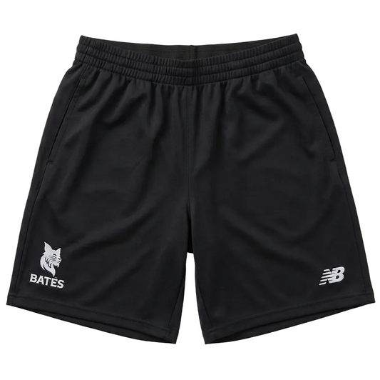 Black athletic shorts with an elastic waistband, featuring a white printed New Balance logo on the left leg and a white printed Bates text with a bobcat graphic on the right leg, displayed flat against a light gray background.