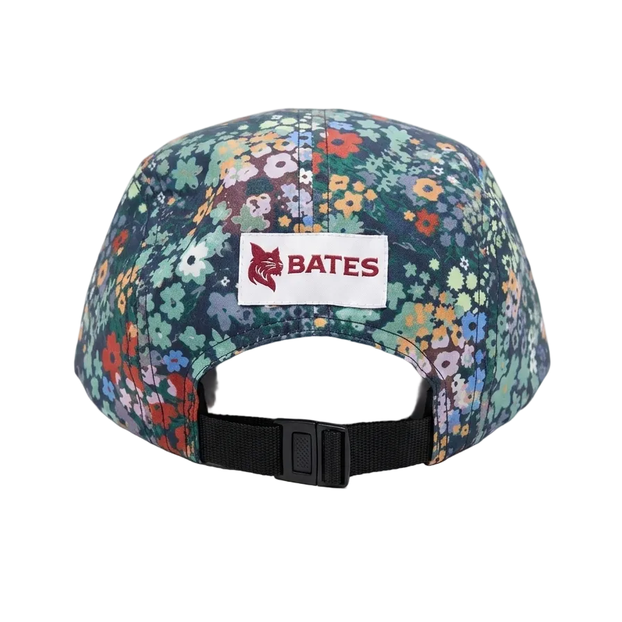 Floral-patterned cap with Bates logo on a white background